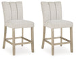 Larawyn Bisque Counter Height Barstool, Set of 2 by Ashley at Eve Furniture