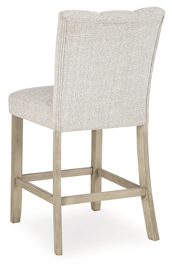 Larawyn Bisque Counter Height Barstool, Set of 2 by Ashley at Eve Furniture