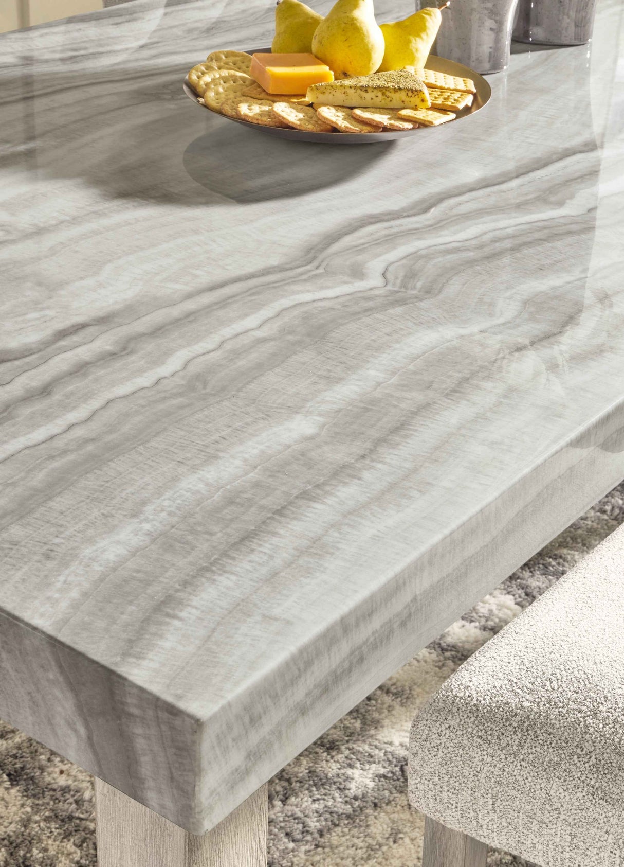 Larawyn Bisque Marble Top Dining Table by Ashley at Eve Furniture