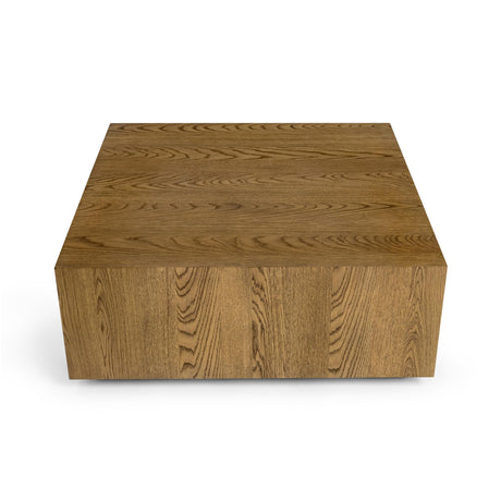 Layne Light Brown Coffee Table with Casters by Classic Home at Eve Furniture