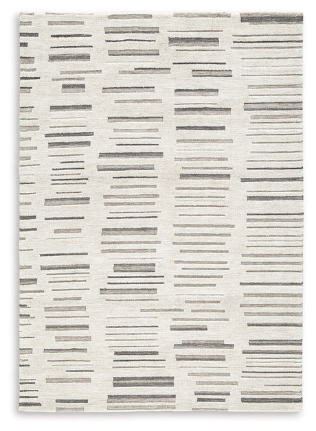 Leesdale Ivory/Brown/Black 5' x 7' Rug by Ashley at Eve Furniture