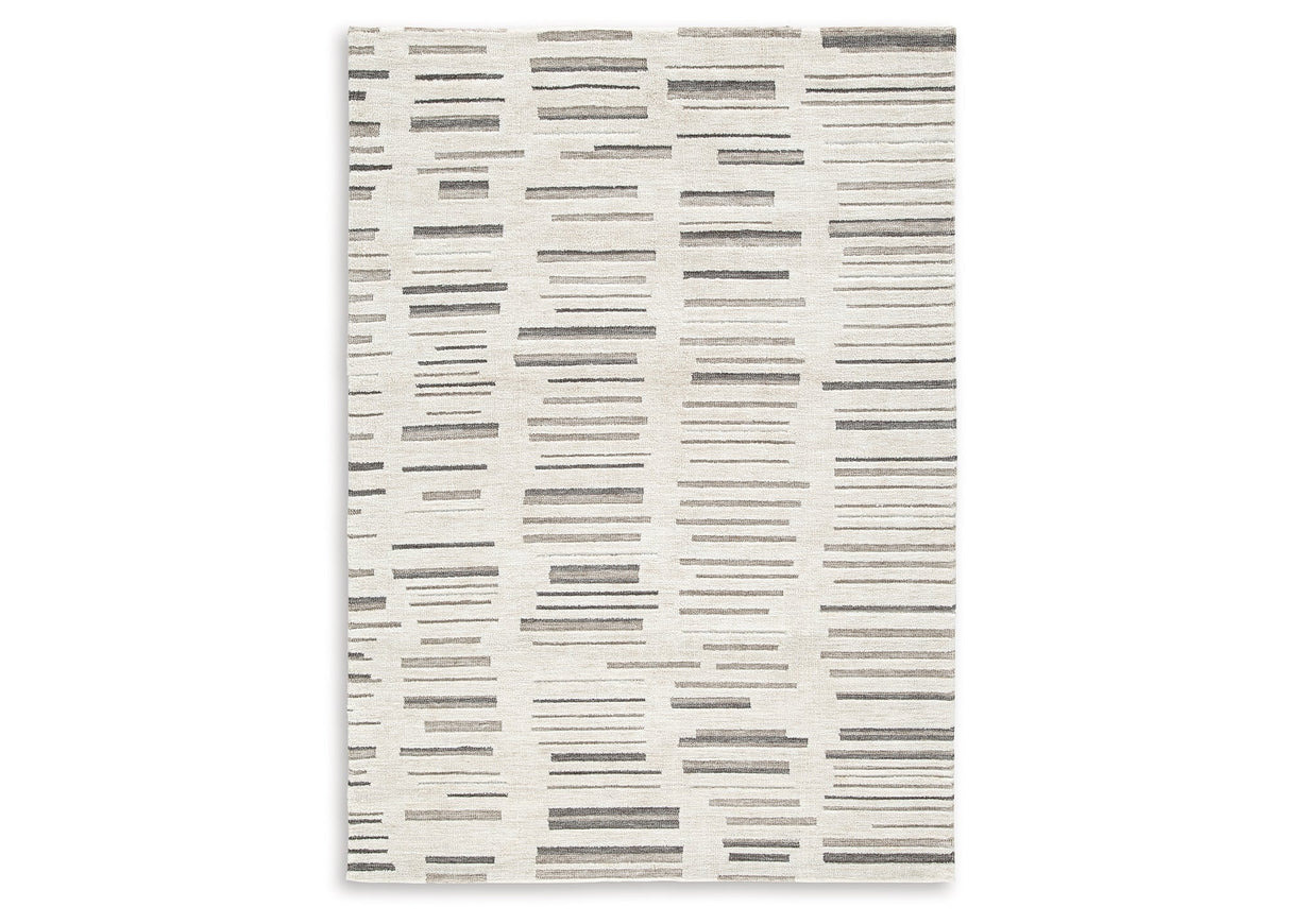 Leesdale Ivory/Brown/Black 5' x 7' Rug by Ashley at Eve Furniture