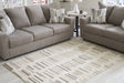 Leesdale Ivory/Brown/Black 5' x 7' Rug by Ashley at Eve Furniture
