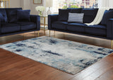 Leonelle Cream/Blue/Gray Medium Rug by Ashley at Eve Furniture