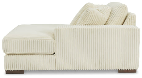 Lindyn Ivory 2-Piece Super Chaise by Ashley at Eve Furniture