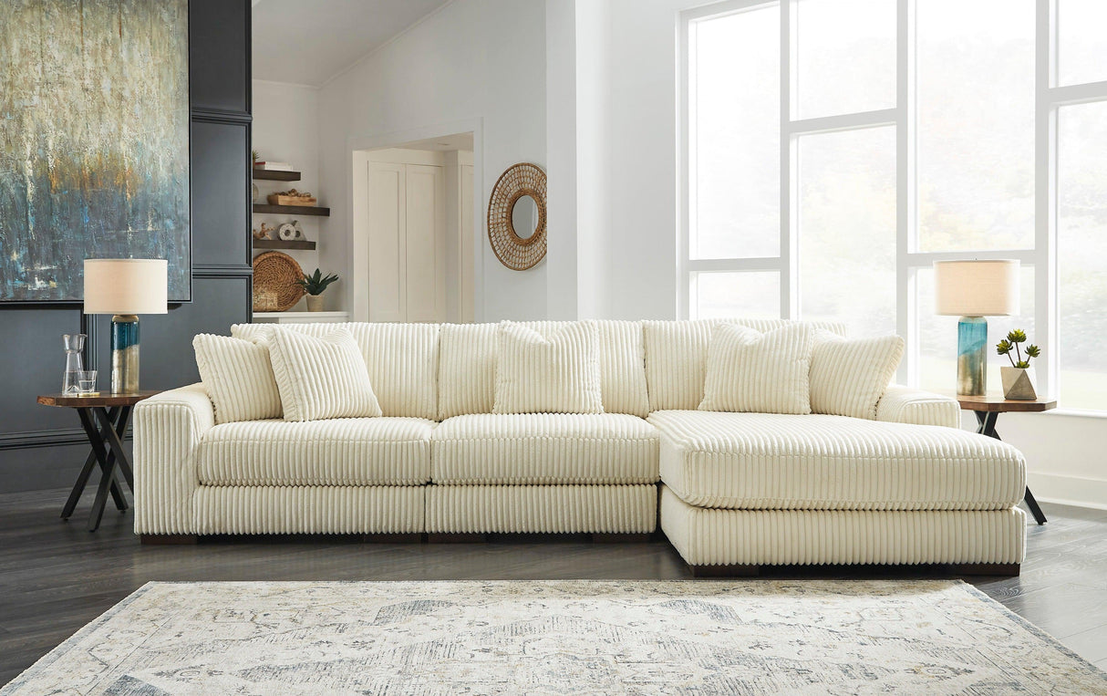 Lindyn Ivory 3-Piece Right Arm Facing Modular Chaise Sectional by Ashley at Eve Furniture