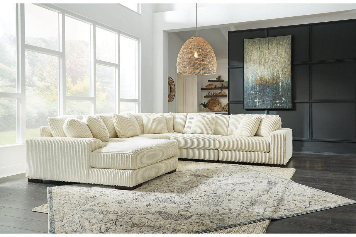Lindyn Ivory 5-Piece Left Arm Facing Modular Chaise Sectional by Ashley at Eve Furniture