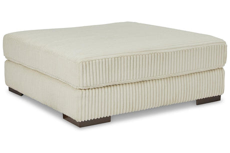 Lindyn Ivory Oversized Accent Ottoman by Ashley at Eve Furniture