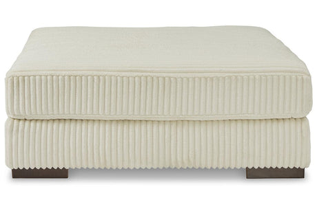 Lindyn Ivory Oversized Accent Ottoman by Ashley at Eve Furniture