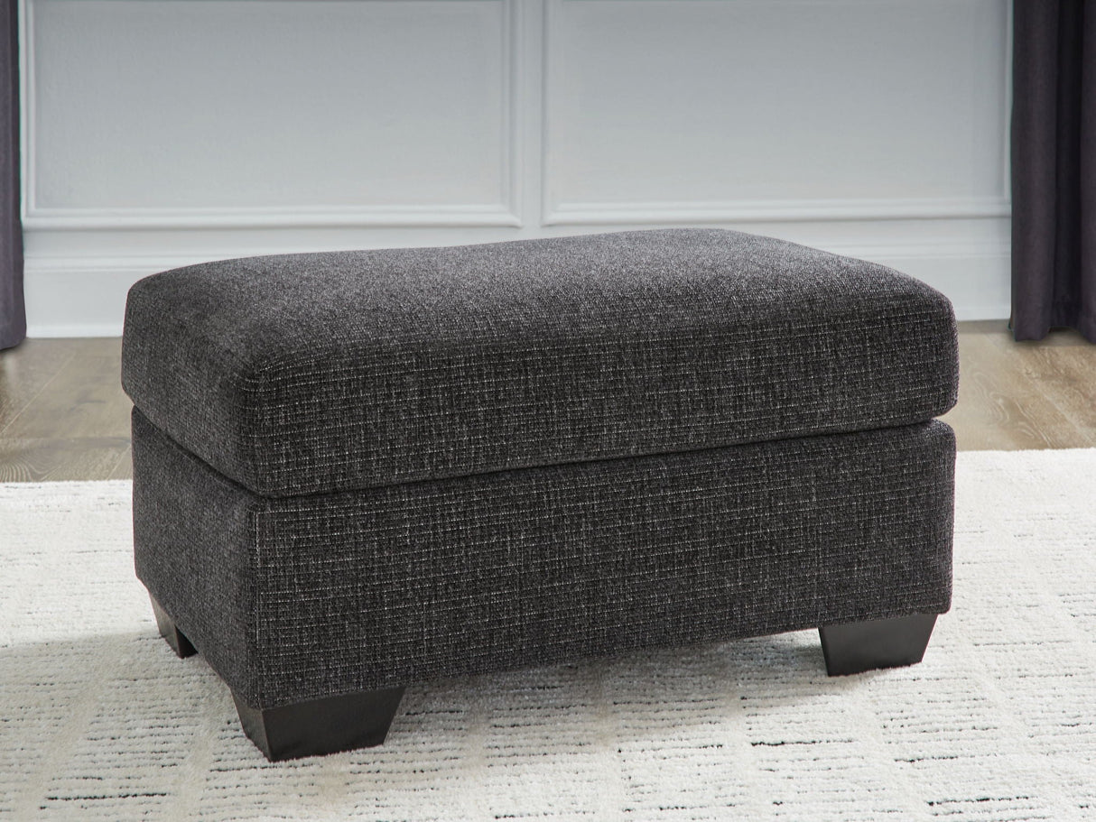 Loreo Ebony Ottoman by Ashley at Eve Furniture