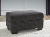 Loreo Ebony Ottoman by Ashley at Eve Furniture