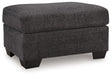 Loreo Ebony Ottoman by Ashley at Eve Furniture