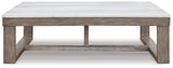 Loyaska Brown/Ivory Coffee Table by Ashley at Eve Furniture