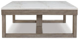 Loyaska Brown/Ivory Coffee Table by Ashley at Eve Furniture