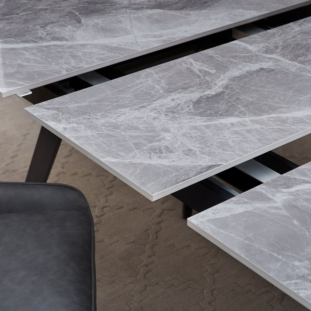 Lucia Extendable Stone Top Metal Leg Dining Table in Piedra and Black by Modus Furniture at Eve Furniture