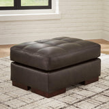 Luigi Thunder Leather Ottoman by Ashley at Eve Furniture