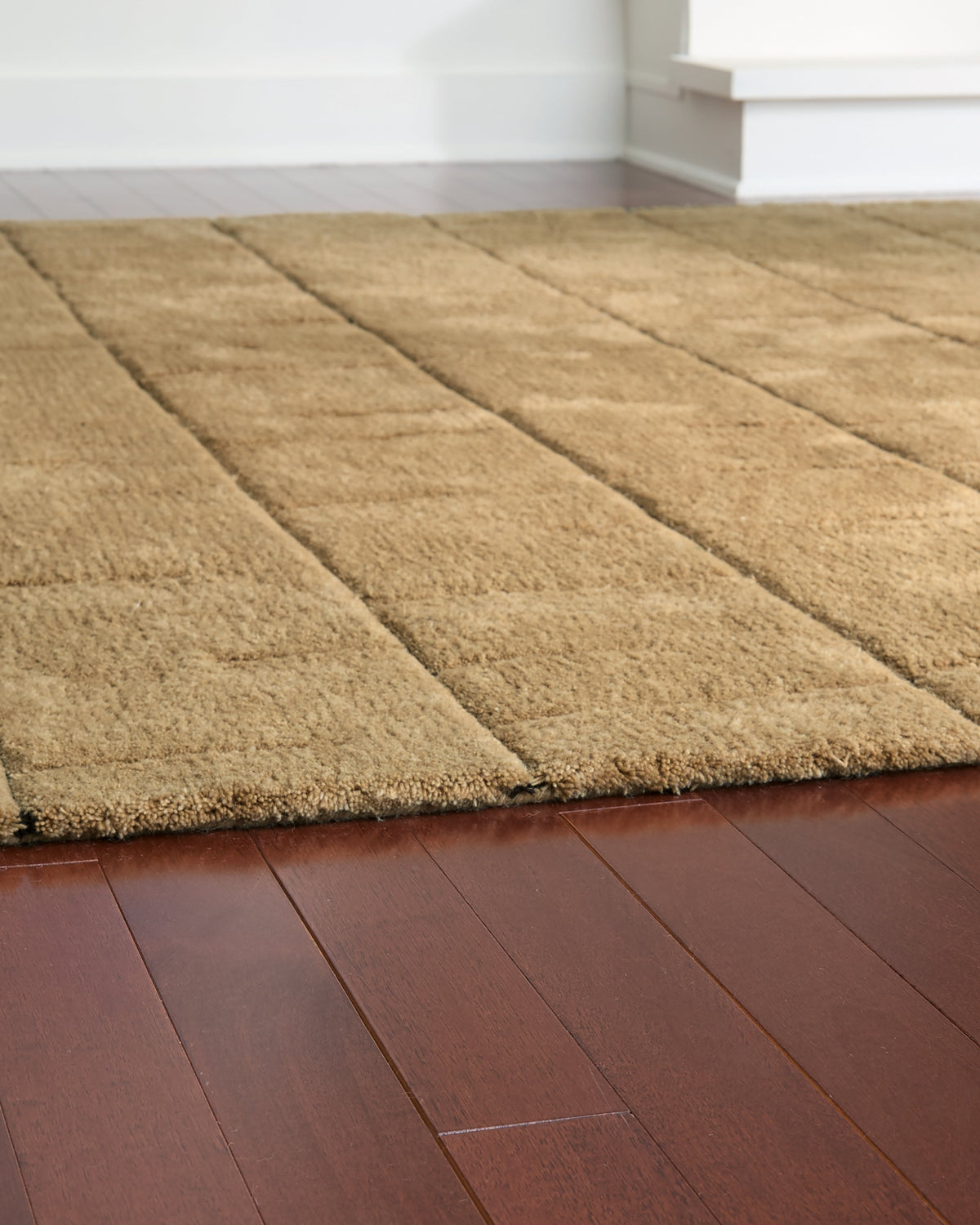 Luzmont Golden Brown Extra Large Rug by Ashley at Eve Furniture