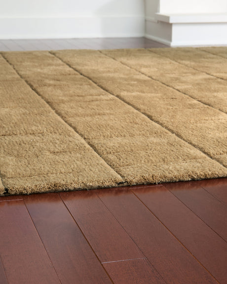 Luzmont Golden Brown Medium Rug by Ashley at Eve Furniture