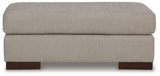 Maggie Flax Ottoman by Ashley at Eve Furniture