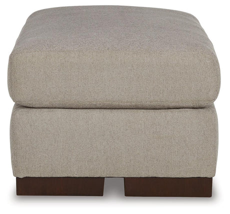 Maggie Flax Ottoman by Ashley at Eve Furniture