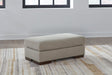Maggie Flax Ottoman by Ashley at Eve Furniture