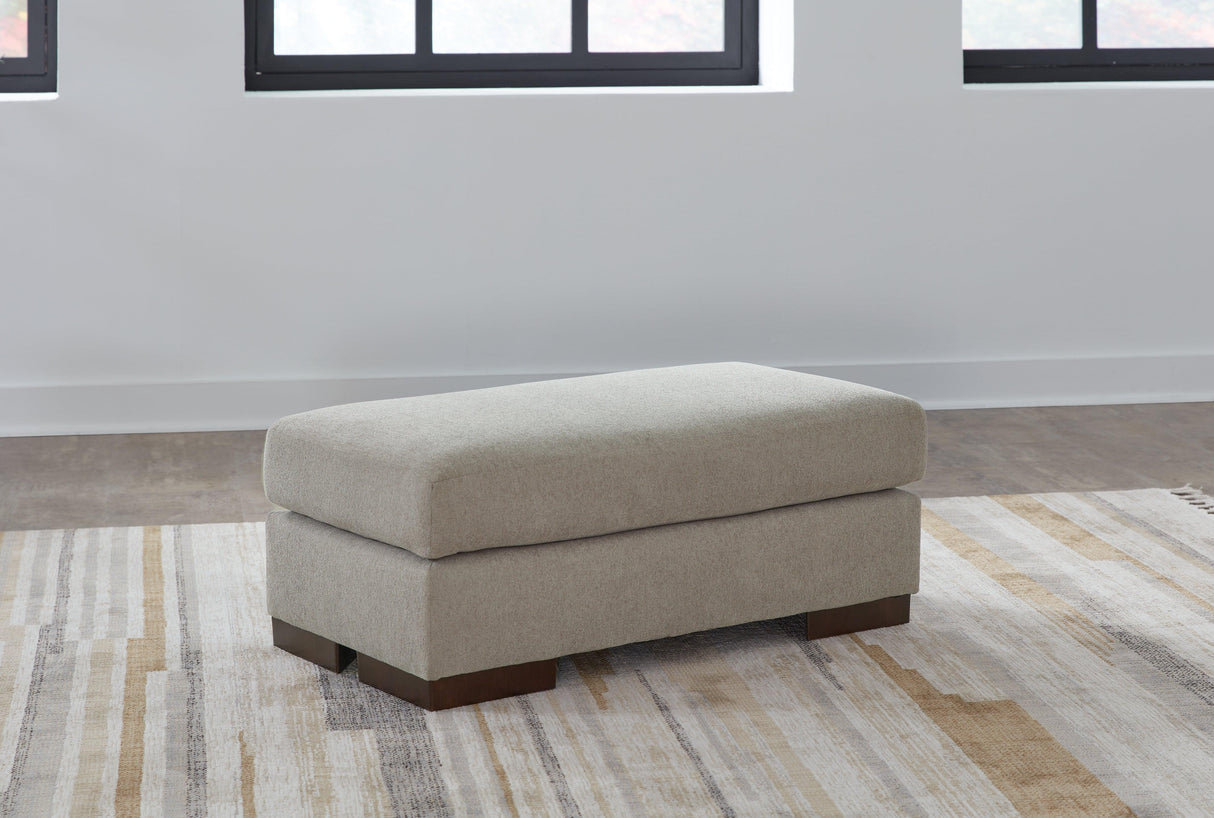 Maggie Flax Ottoman by Ashley at Eve Furniture