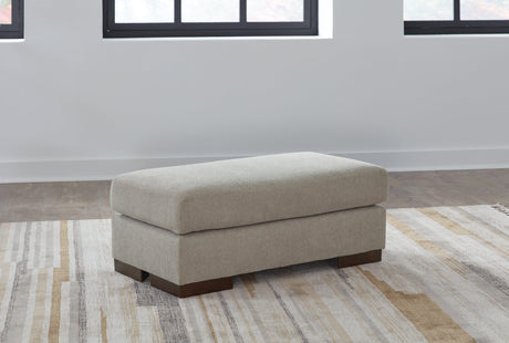 Maggie Flax Ottoman by Ashley at Eve Furniture