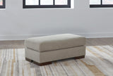 Maggie Flax Ottoman by Ashley at Eve Furniture