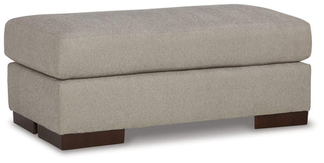 Maggie Flax Ottoman by Ashley at Eve Furniture