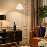 Majestic Brass Ring Base Curved Floor Lamp by Ashcroft Furniture at Eve Furniture