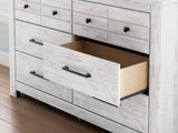 Makidern Whitewash Dresser by ASHLEY FURNITURE at Eve Furniture