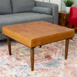 Mark Mid-Century Tufted Square Genuine Leather Upholstered Ottoman In Tan by Ashcroft Furniture at Eve Furniture