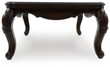 Maylee Dark Brown Coffee Table by Ashley at Eve Furniture