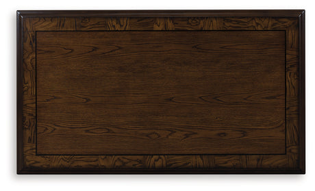 Maylee Dark Brown Coffee Table by Ashley at Eve Furniture