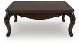 Maylee Dark Brown Coffee Table by Ashley at Eve Furniture