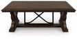 Maylee Dark Brown Coffee Table by Ashley at Eve Furniture