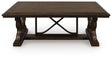 Maylee Dark Brown Coffee Table by Ashley at Eve Furniture