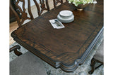 Maylee Dark Brown Dining Extension Table by Ashley at Eve Furniture
