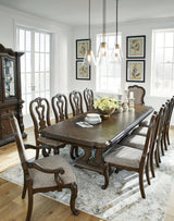 Maylee Dark Brown Dining Table and 10 Chairs by Ashley at Eve Furniture