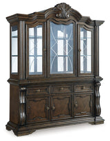 Maylee Dining Table and 10 Chairs with Storage in Dark Brown by Ashley at Eve Furniture