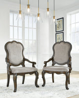 Maylee Dining Table and 10 Chairs with Storage in Dark Brown by Ashley at Eve Furniture