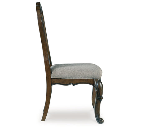Maylee Dining Table and 10 Chairs with Storage in Dark Brown by Ashley at Eve Furniture