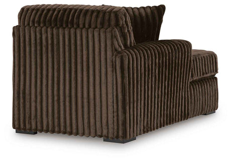 Midnight-Madness Chocolate 3-Piece Sectional with Ottoman by Ashley at Eve Furniture