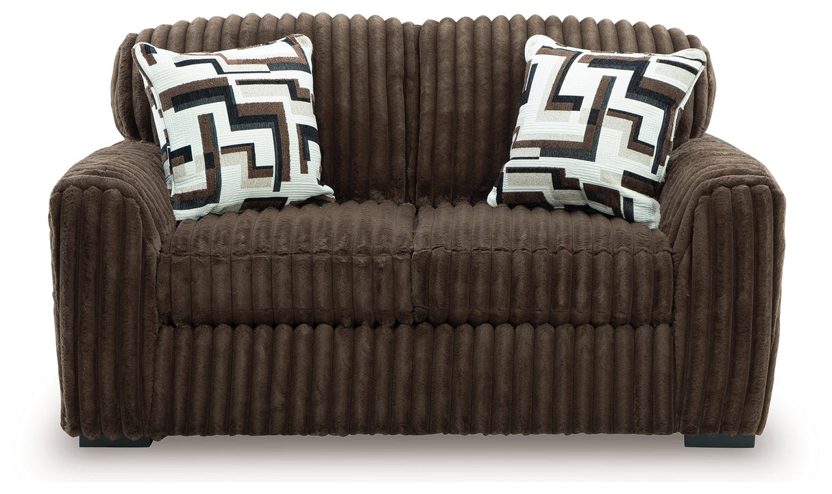 Midnight-Madness Chocolate Loveseat, Oversized Chaise and Ottoman by Ashley at Eve Furniture