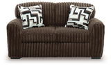 Midnight-Madness Chocolate Loveseat, Oversized Chaise and Ottoman by Ashley at Eve Furniture