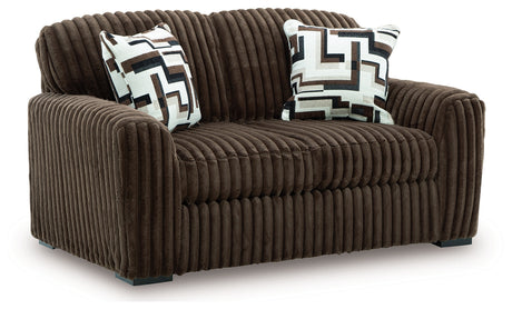 Midnight-Madness Chocolate Loveseat, Oversized Chaise and Ottoman by Ashley at Eve Furniture