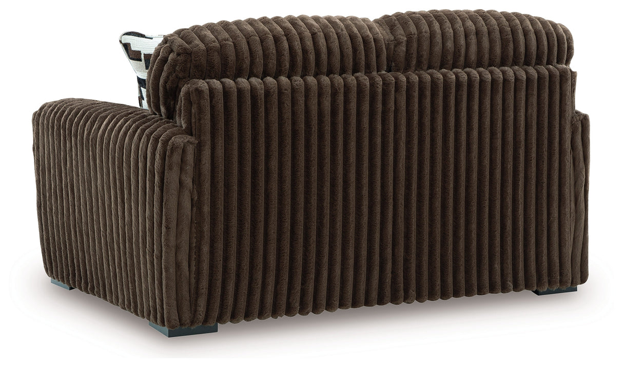 Midnight-Madness Chocolate Loveseat, Oversized Chaise and Ottoman by Ashley at Eve Furniture