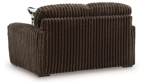 Midnight-Madness Chocolate Loveseat, Oversized Chaise and Ottoman by Ashley at Eve Furniture