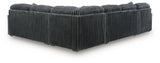 Midnight-Madness Gunmetal 4-Piece Sectional and Ottoman by Ashley at Eve Furniture