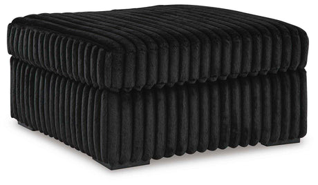 Midnight-Madness Onyx Sofa and Oversized Ottoman by Ashley at Eve Furniture